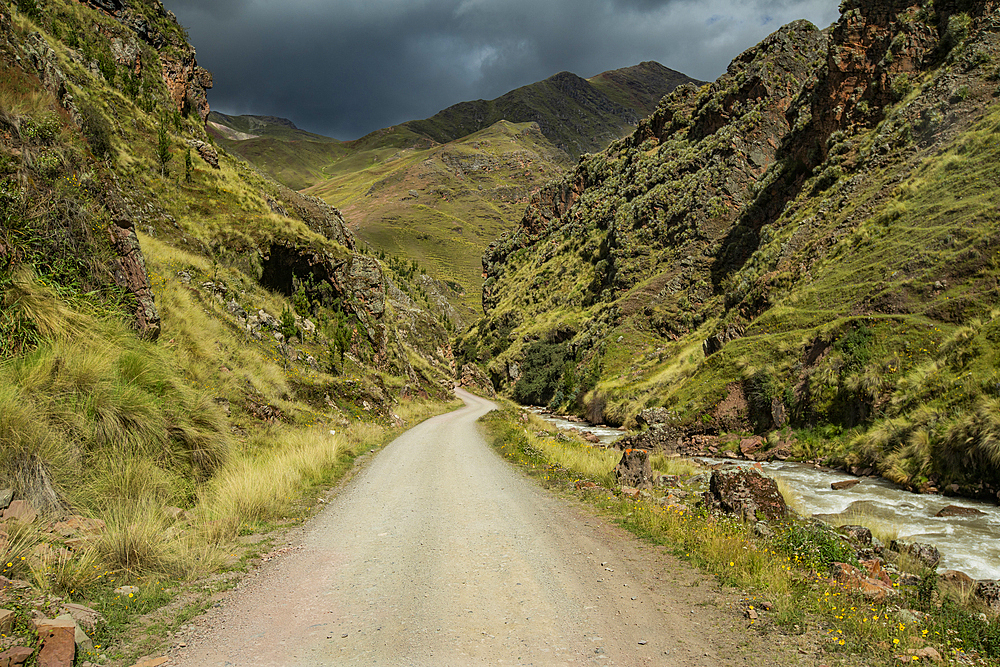 Empty dirt road to Rainbow Mountain
