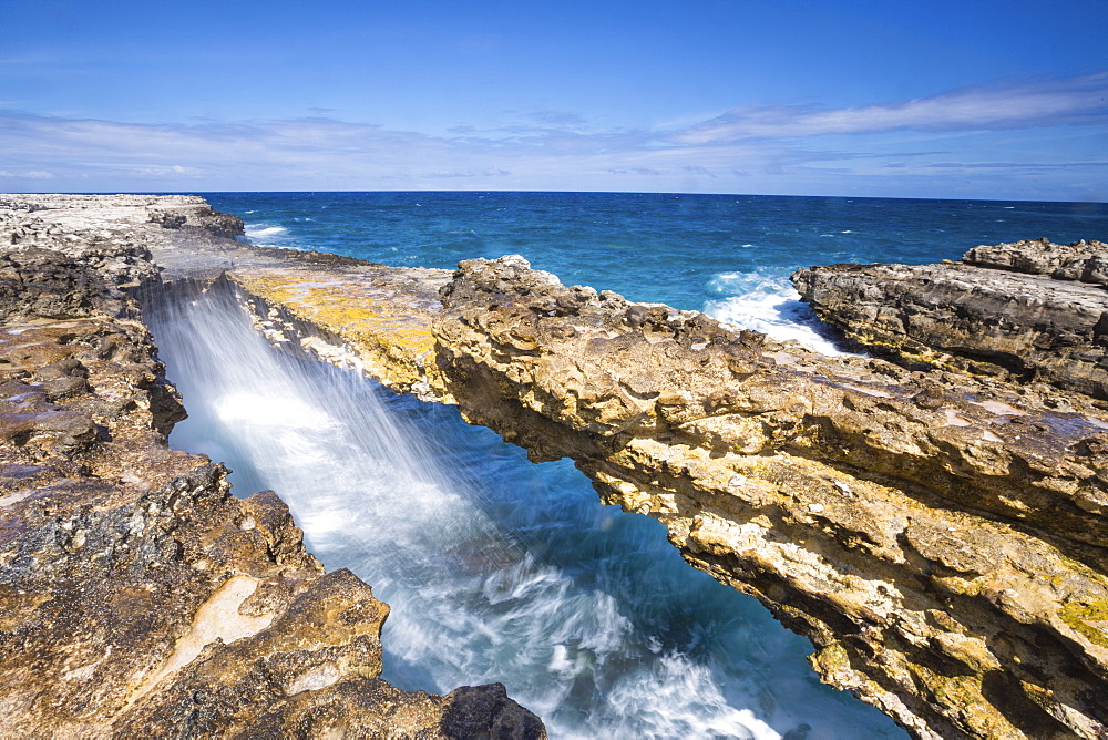 Waves in the natural arches of limestone Devil's Bridge, Antigua, Antigua and Barbuda, Leeward Islands, West Indies, Caribbean, Central America