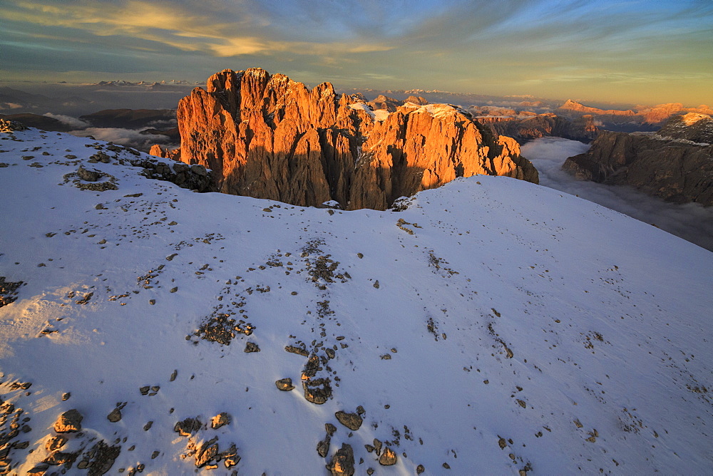 The pinnacles of the Sassolungo (Langkofel), in the red rays of the sunset, South Tyrol, Dolomites, Italy, Europe