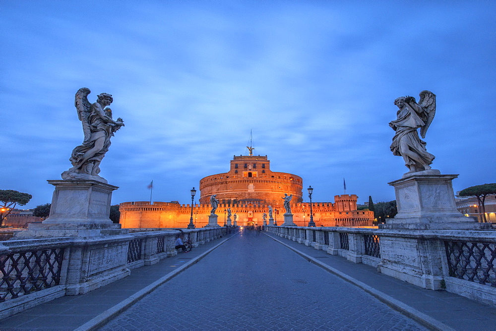 Dusk on the ancient palace of Castel Sant'Angelo with statues of angels on the bridge on Tiber RIver, UNESCO World Heritage Site, Rome, Lazio, Italy, Europe