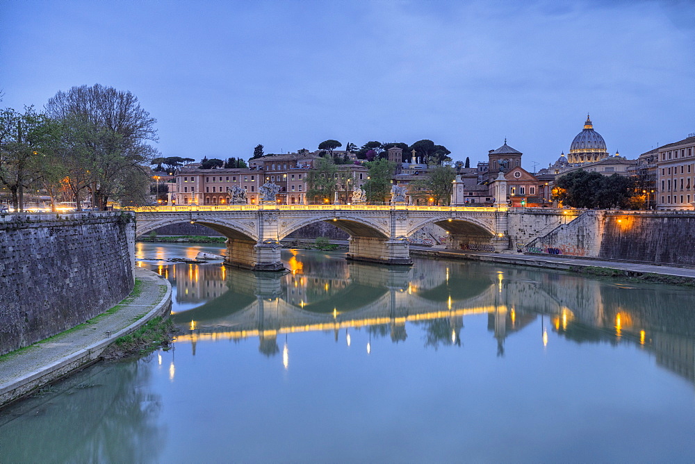 Dusk on Tiber River with Umberto I Bridge and the Basilica di San Pietro in the Vatican in the background, Rome, Lazio, Italy, Europe