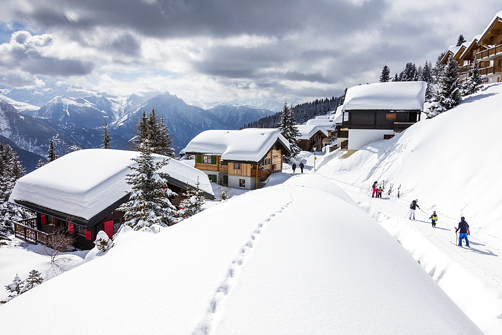 Tourists and skiers enjoying the snowy landscape, Bettmeralp, district of Raron, canton of Valais, Switzerland, Europe