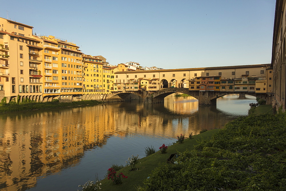 View of Ponte Vecchio, a medieval stone arch bridge on the Arno River, one of the symbols of Florence, UNESCO World Heritage Site, Tuscany, Italy, Europe