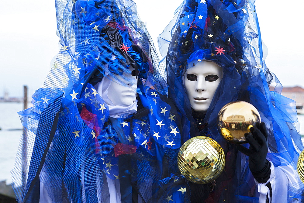 Colourful masks and costumes of the Carnival of Venice, famous festival worldwide, Venice, Veneto, Italy, Europe