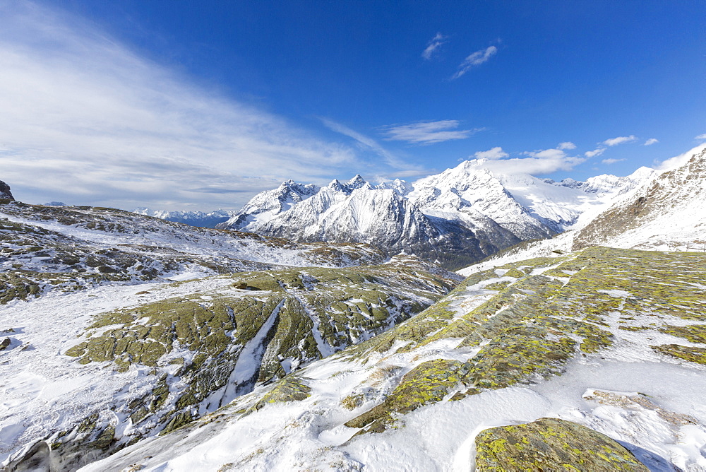 Sunshine and snow at Alpe Fora with Monte Disgrazia in the background, Malenco Valley, Province of Sondrio, Valtellina, Lombardy, Italy, Europe