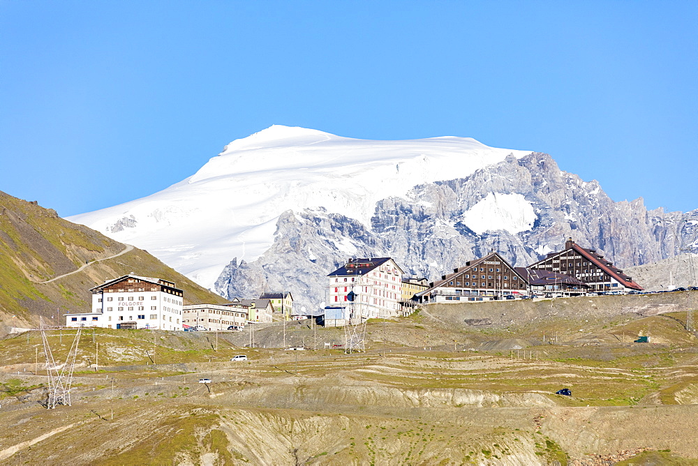 Blue sky frames the snowy peak of Mount Ortles at Stelvio Pass, Valtellina, Lombardy, Italy, Europe