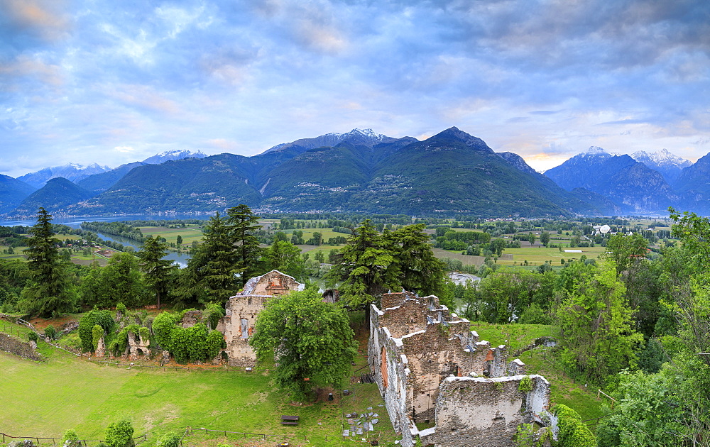 Panorama of ancient ruins of Fort Fuentes framed by green hills at dawn, Colico, Lecco province, Valtellina, Lombardy, Italy, Europe