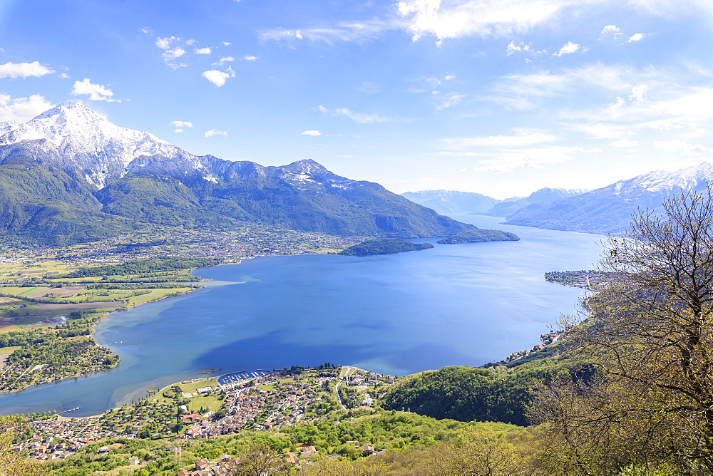 View over Lake Como and villages framed by snowy peaks, Montemezzo, Alpe Zocca, Lombardy, Italian Lakes, Italy, Europe