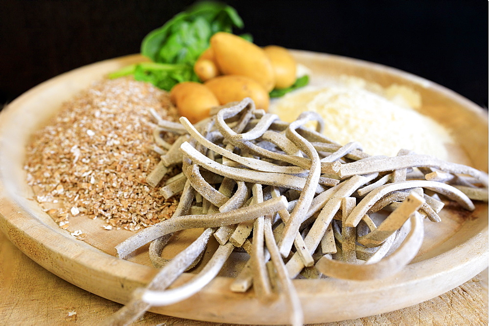 Ingredients for Pizzoccheri, a flat ribbon pasta cooked with Savoy cabbage and cubed potatoes, Valtellina, Lombardy, Italy, Europe