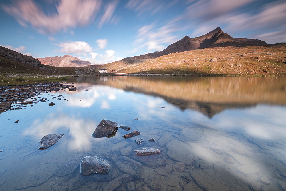 Clouds reflected in water at dawn, Lago Bianco, Gavia Pass, Valfurva, Valtellina, Lombardy, Italy, Europe