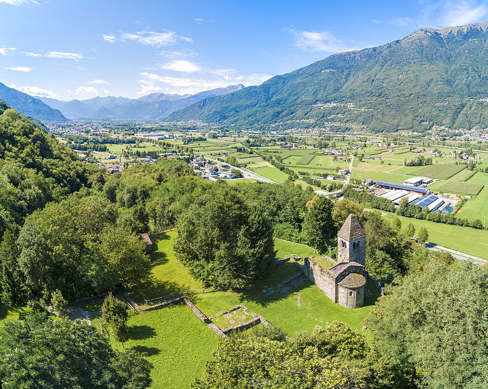 Panoramic of medieval Abbey of San Pietro in Vallate, Piagno, Sondrio province, Lower Valtellina, Lombardy, Italy, Europe (Drone)