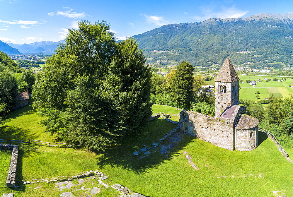 Panoramic of medieval Abbey of San Pietro in Vallate, Piagno, Sondrio province, Lower Valtellina, Lombardy, Italy, Europe (Drone)