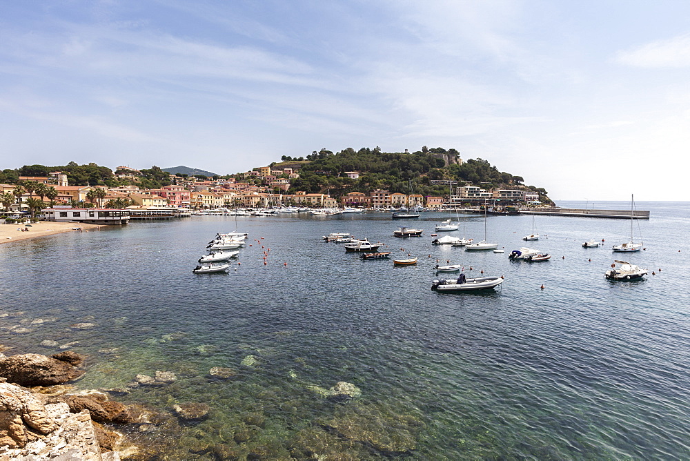 Boats moored in the harbor, Porto Azzurro, Elba Island, Livorno Province, Tuscany, Italy, Europe