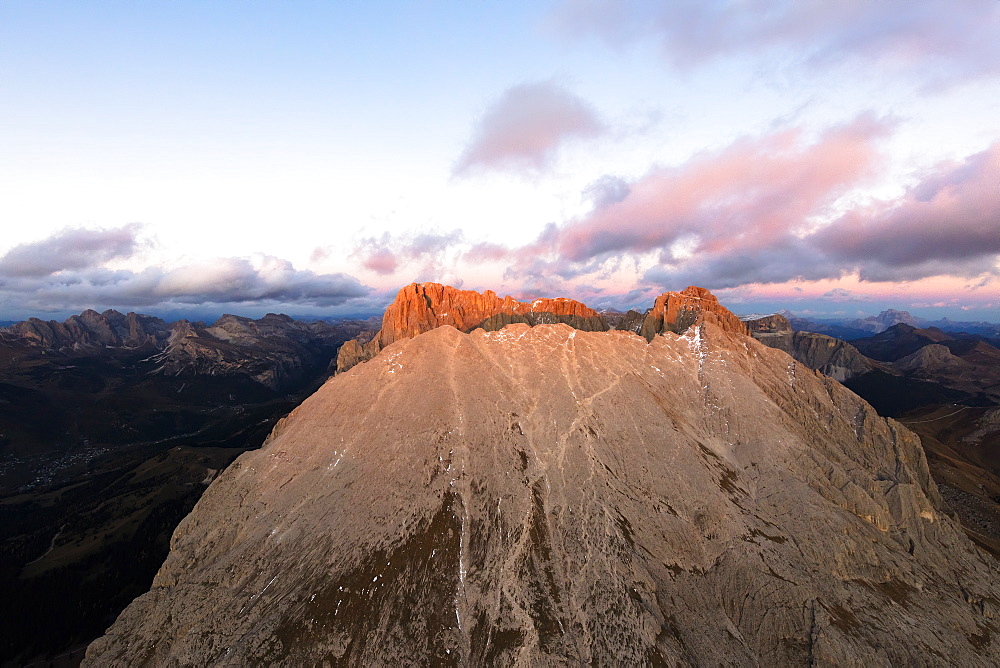 Aerial view of Sassolungo and Sassopiatto mountain range at sunset, Dolomites, South Tyrol, Italy, Europe