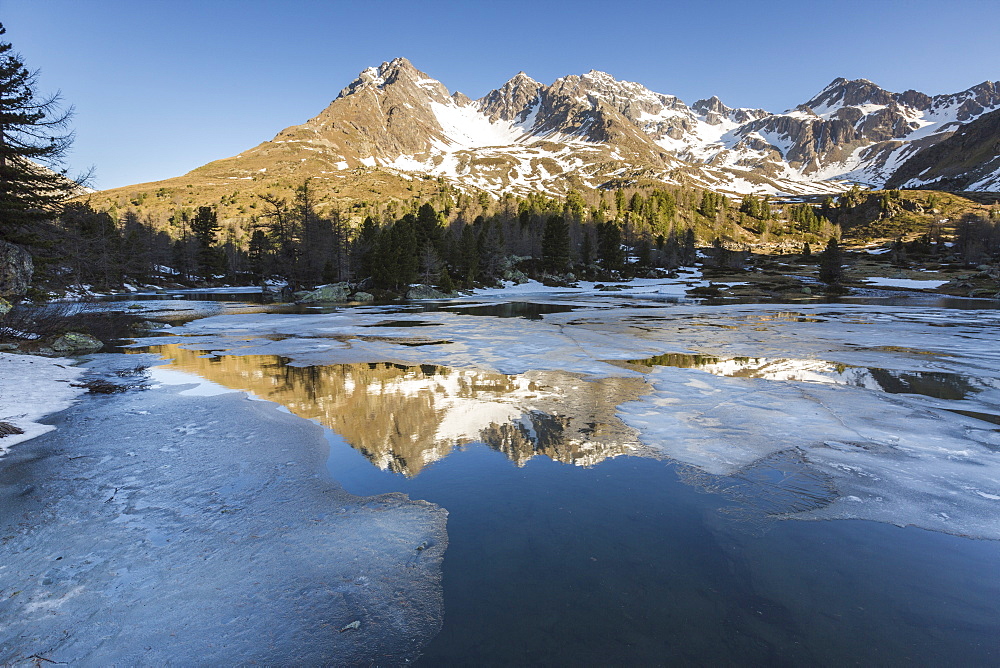 Spring thaw at Lago Viola, Val di Campo, Poschiavo region, Canton of Graubunden, Switzerland, Europe