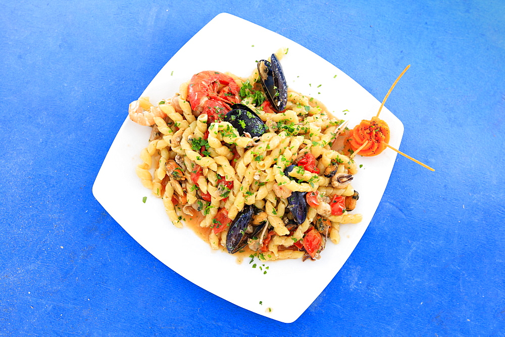 Pasta with seafood on platter, Sicily, Italy, Europe