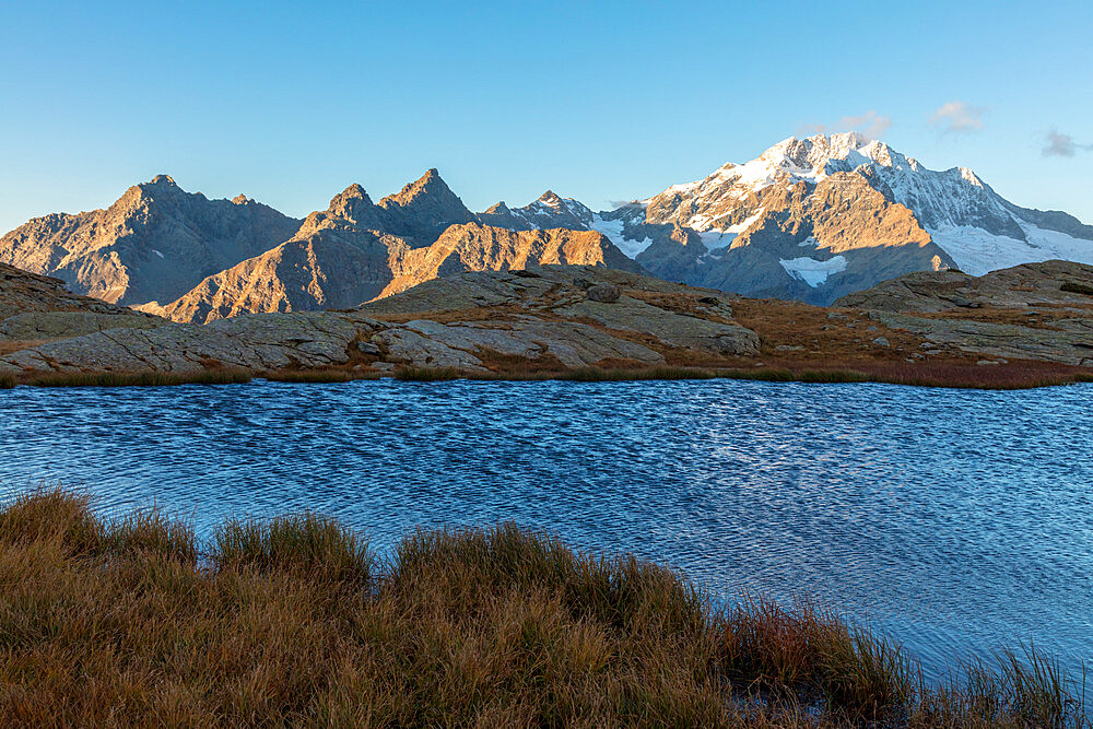 Alpine lake with Monte Disgrazia on background, Alpe Fora, Malenco Valley, province of Sondrio, Valtellina, Lombardy, Italy, Europe