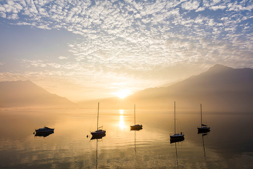 Boats at sunrise, Domaso, Lake Como, Lombardy, Italian Lakes, Italy, Europe