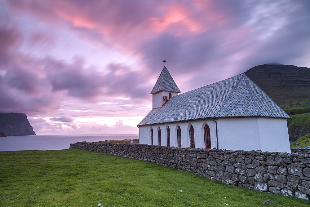 Sunrise on church of Vidareidi, Vidoy Island, Faroe Islands, Denmark, Europe