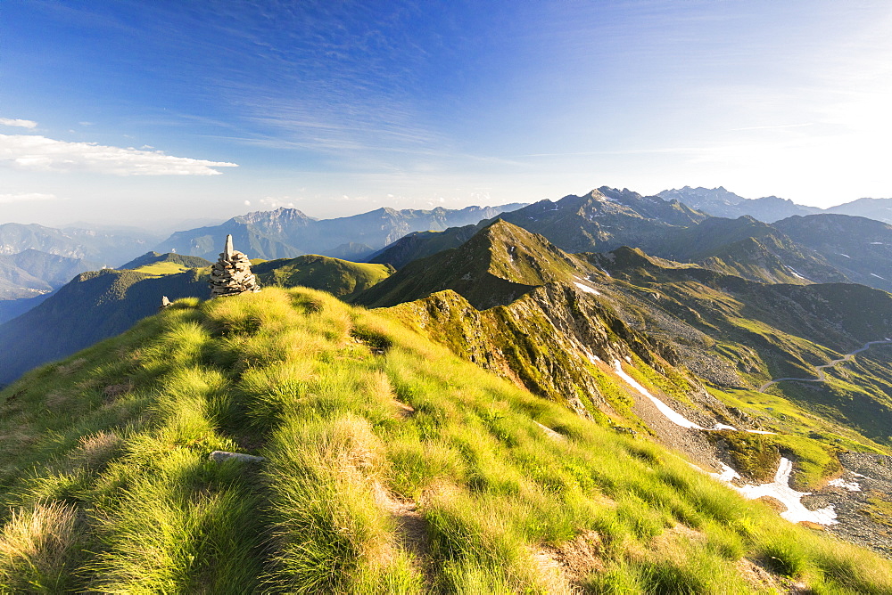 Grass on the steep ridge on the ascent towards Monte Azzarini, San Marco Pass, Albaredo Valley, Orobie Alps, Lombardy, Italy, Europe