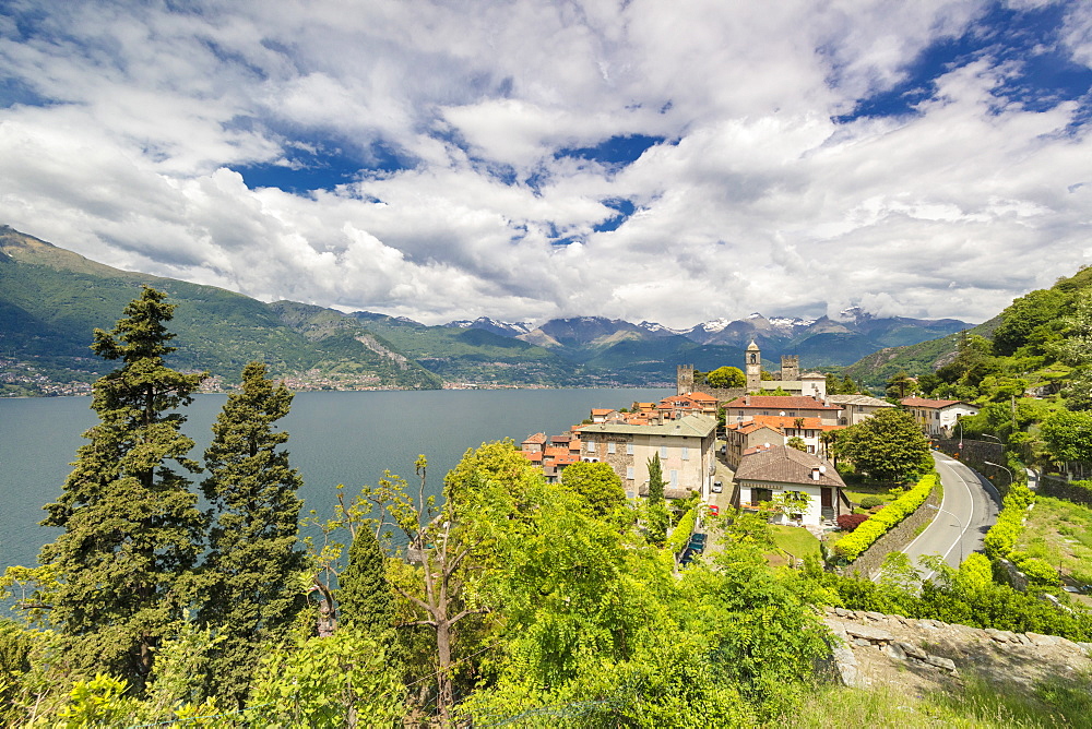 Clouds over the medieval village of Corenno Plinio and Lake Como, Dervio, Lecco province, Lombardy, Italian Lakes, Italy, Europe