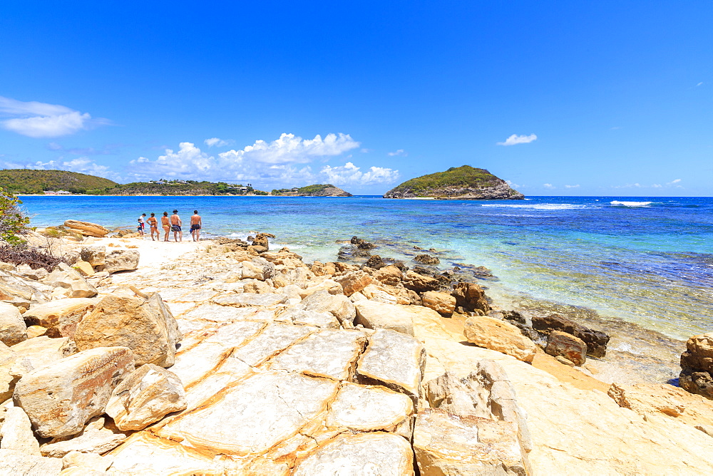 People on rocks overlooking the crystal sea, Half Moon Bay, Antigua and Barbuda, Leeward Islands, West Indies, Caribbean, Central America