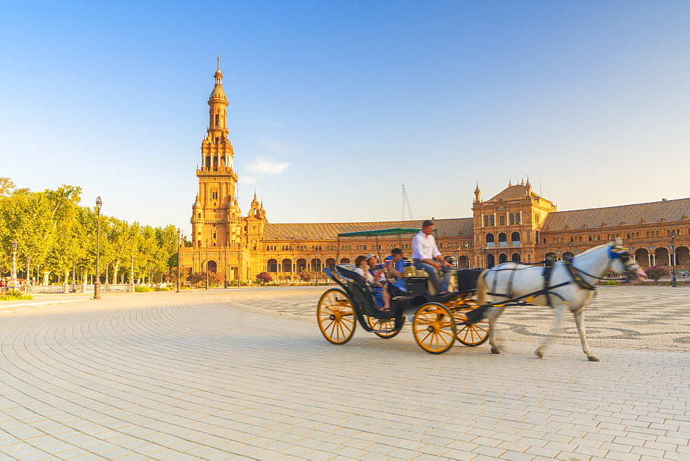 Tourists in horse carriage, one of the major attractions for visitors, Plaza de Espana, Seville, Andalusia, Spain, Europe