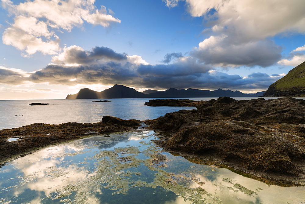 Ocean at sunrise, Gjogv, Eysturoy island, Faroe Islands, Denmark, Europe