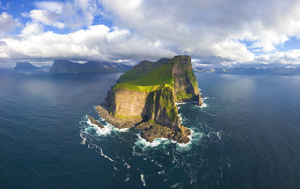 Aerial panoramic of Kallur lighthouse and cliffs, Kalsoy island, Faroe Islands, Denmark, Europe