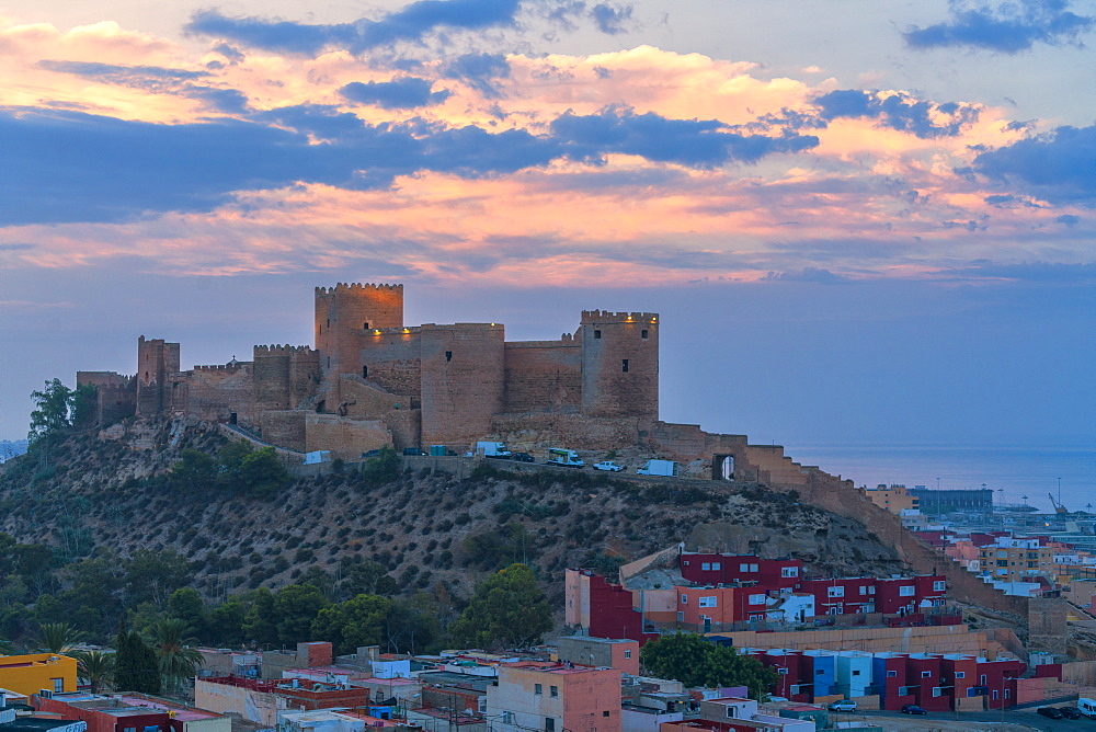 The Alcazaba old Moorish castle and fortress on hilltop at sunrise, Almeria, Andalusia, Spain