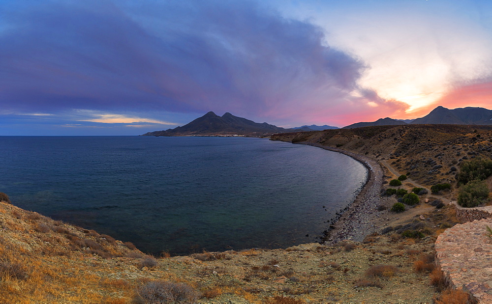 Coastline of La Isleta del Moro at sunset in Cabo de Gata-Nijar Natural Park, Spain, Europe