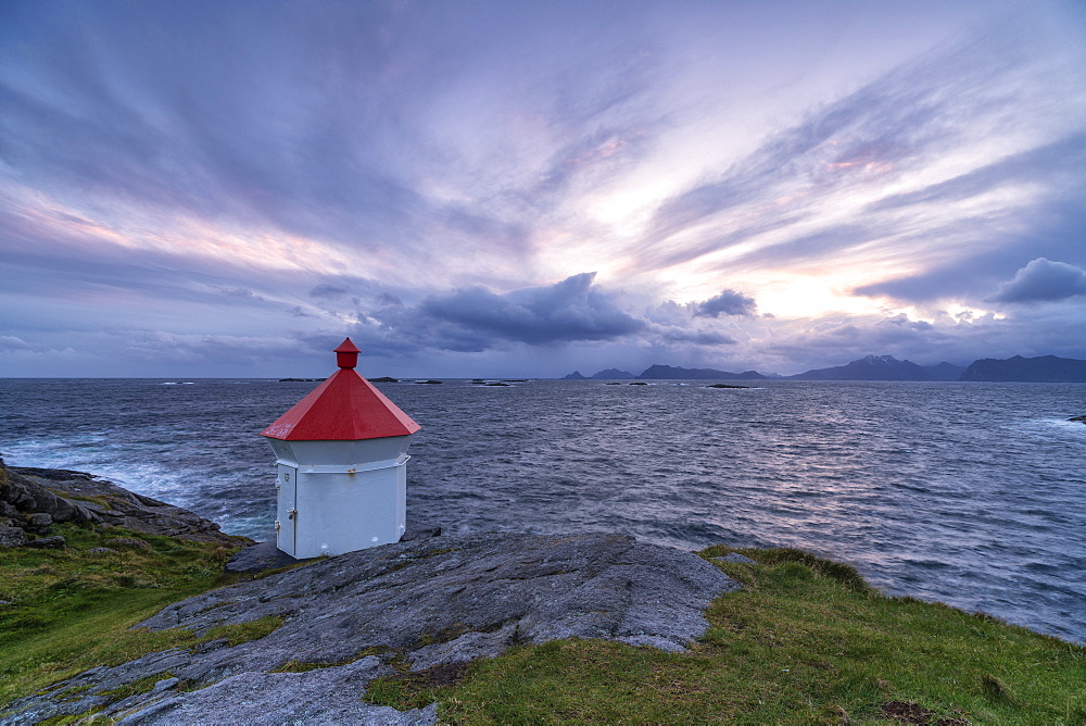 Lighthouse at sunset in Henningsvaer, Lofoten Islands, Norway, Europe