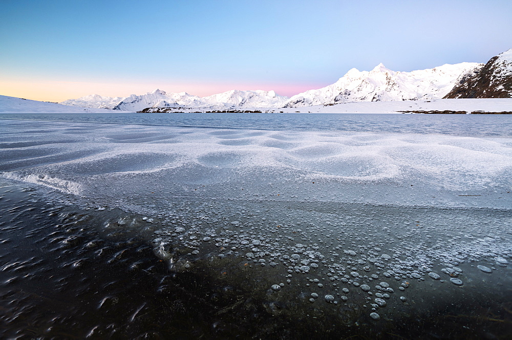 Frozen Lake Andossi in Spluga Valley, Italy, Europe