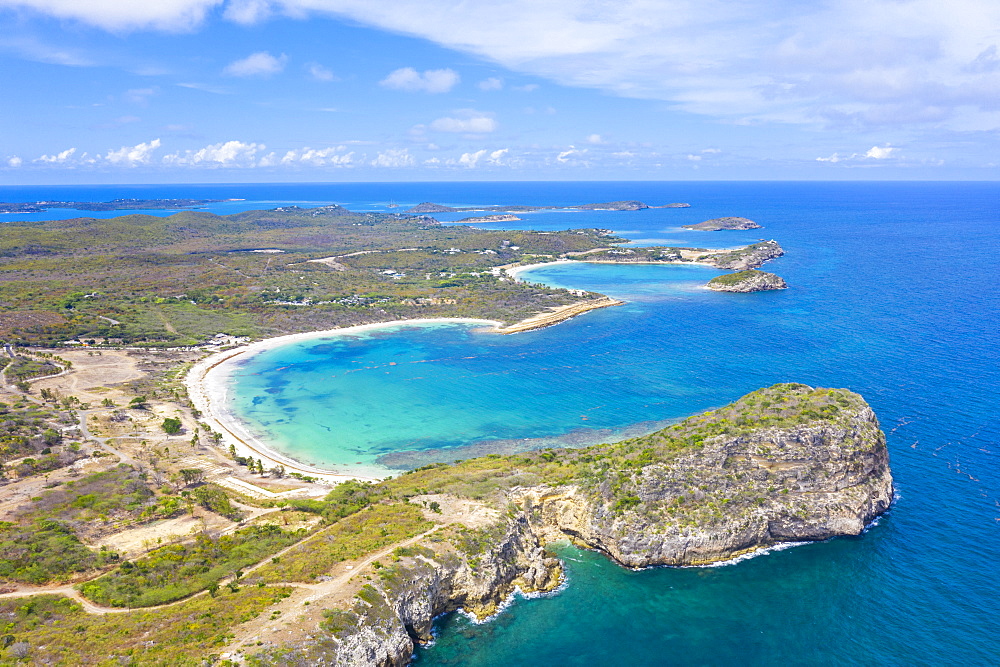 Aerial view by drone of cliffs surrounding Half Moon Bay washed by Caribbean Sea, Antigua, Leeward Islands, West Indies, Caribbean, Central America