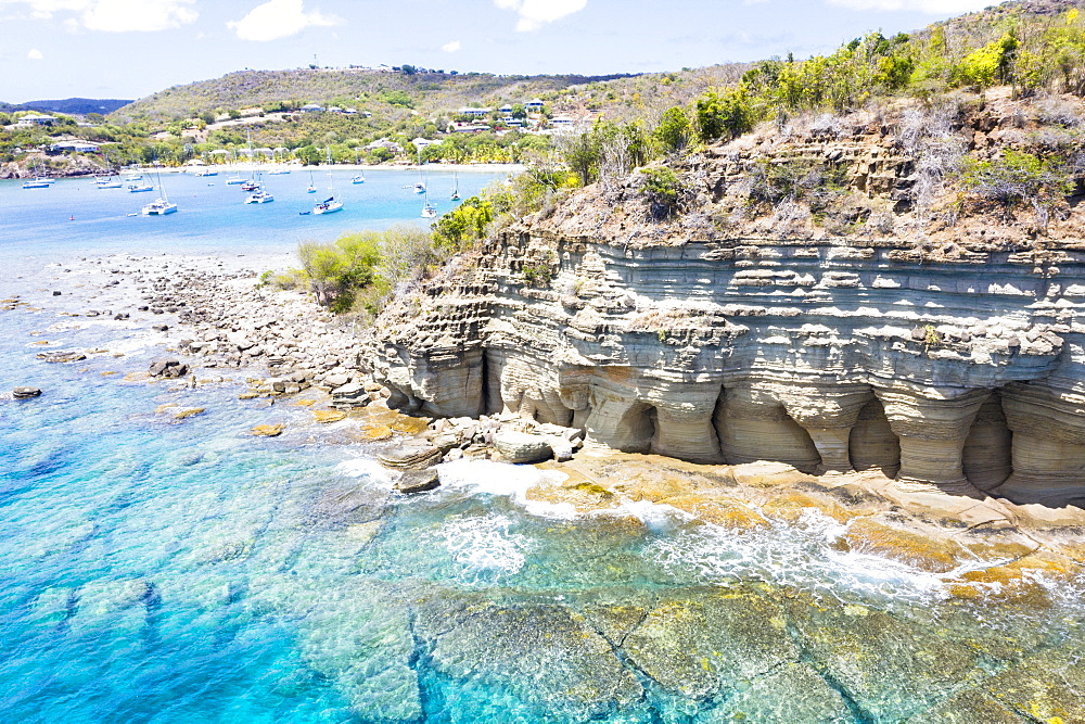 White limestone cliffs Pillar of Hercules washed by Caribbean Sea, aerial view by drone, English Harbour, Antigua, Leeward Islands, West Indies, Caribbean, Central America