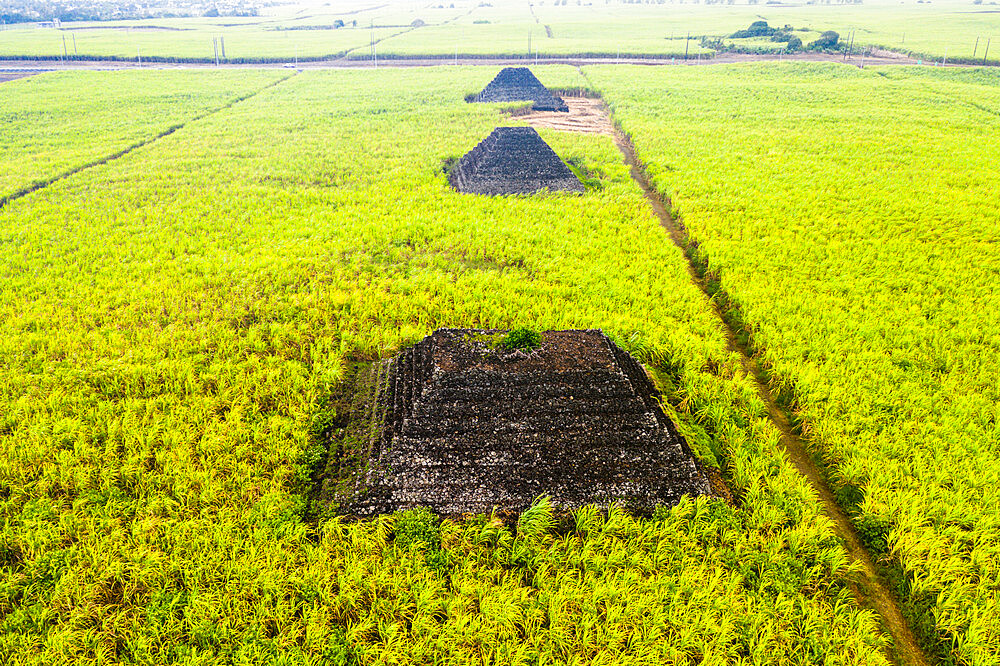 Aerial view by drone of mysterious pyramids in green fields, Plaine Magnien, Grand Port, Mauritius, Indian Ocean, Africa