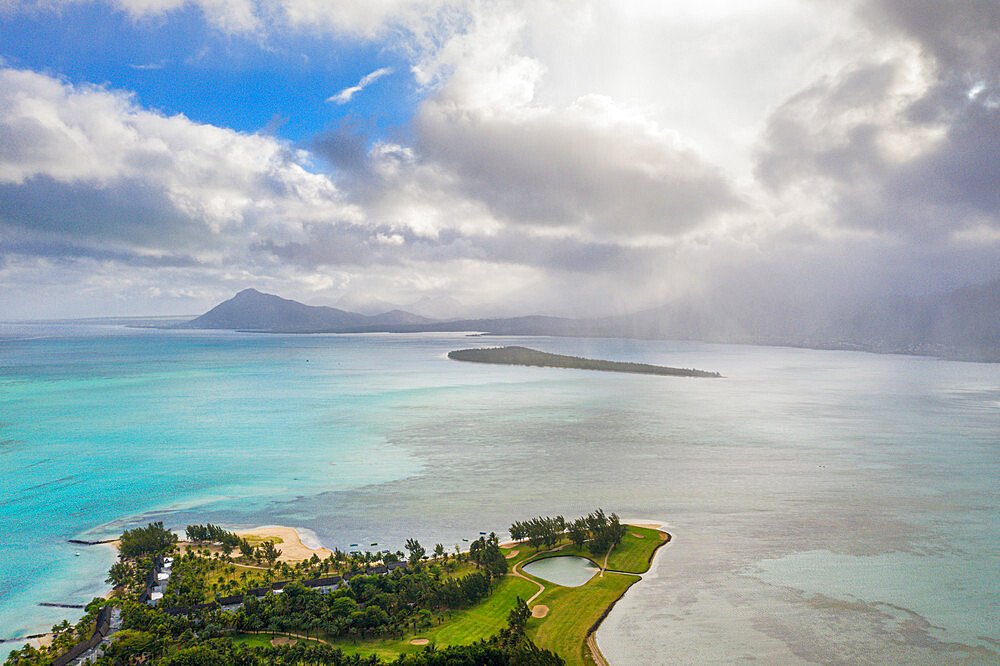 Aerial view by drone of Ile aux Benitiers island seen from golf course of luxury resort, La Gaulette, Le Morne, Mauritius, Indian Ocean, Africa