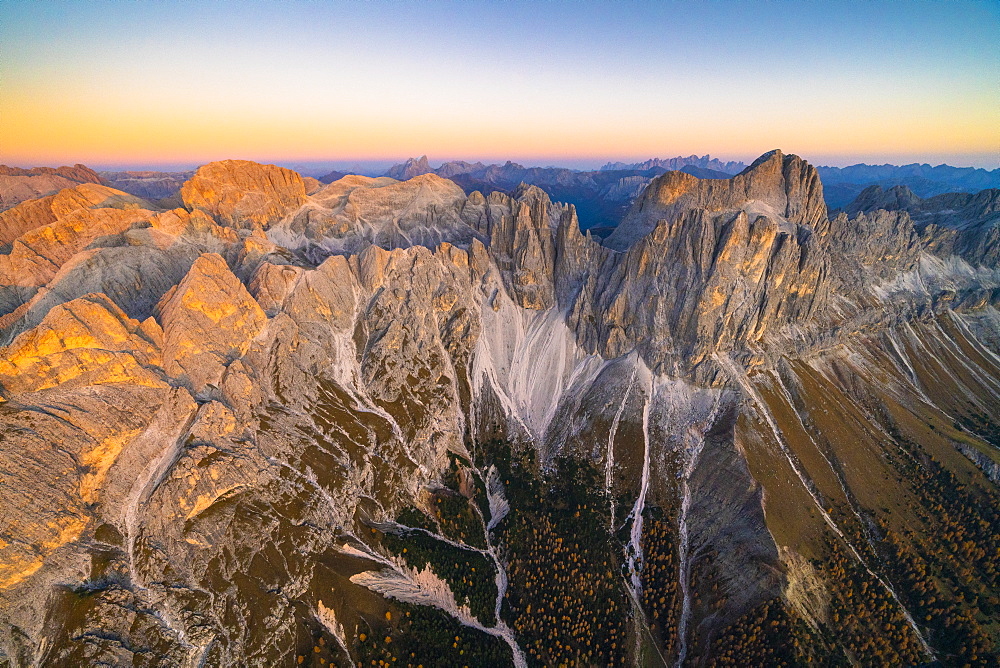 Aerial view of autumn sunset over Torri Del Vajolet, Catinaccio Group and Roda di Vael, Dolomites, South Tyrol, Italy, Europe