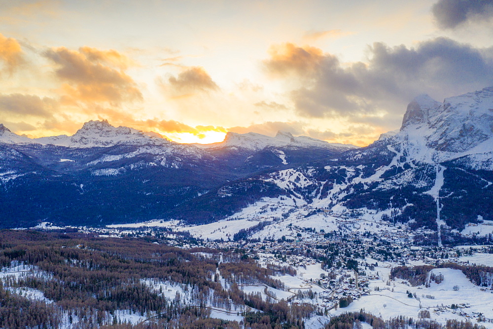 Aerial view of sunrise over Cortina d'Ampezzo in the snowy landscape, Dolomites, Belluno province, Veneto, Italy, Europe