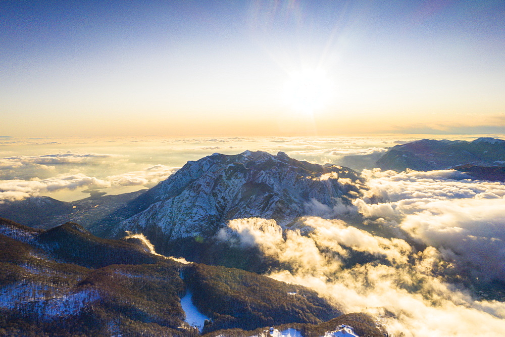 Aerial view of Monte Coltignone in a sea of clouds seen from Piani Resinelli, Lake Como, Lecco province, Lombardy, Italy, Europe