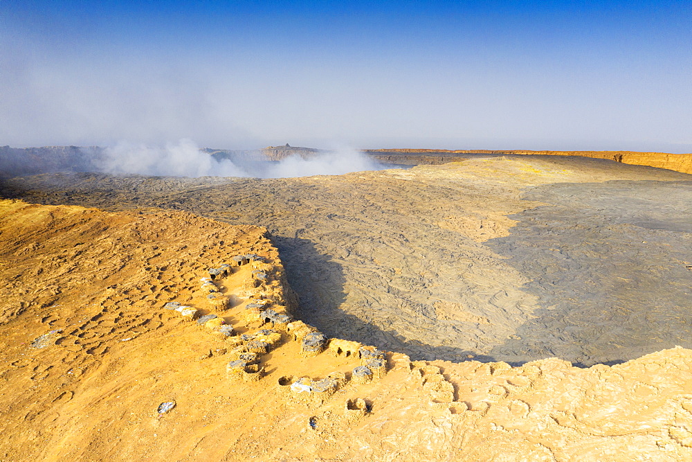 Aerial view of stone huts on top of majestic Erta Ale volcano, Danakil Depression, Afar Region, Ethiopia, Africa