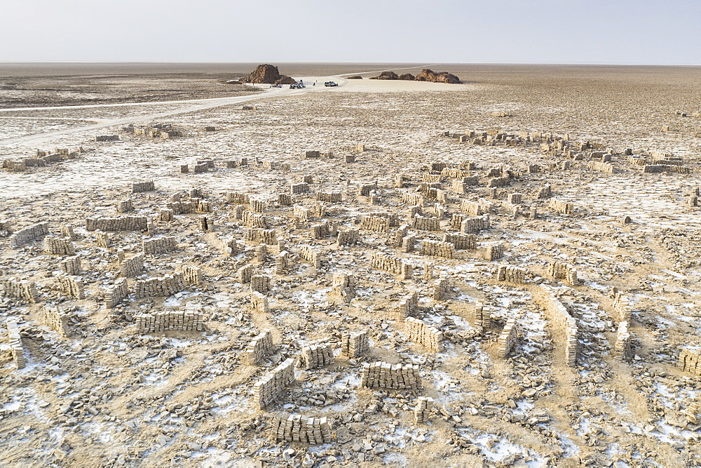 Blocks of salt extracted by miners in the Ahmed Ela Salt Plain, Dallol, Danakil Depression, Afar Region, Ethiopia, Africa