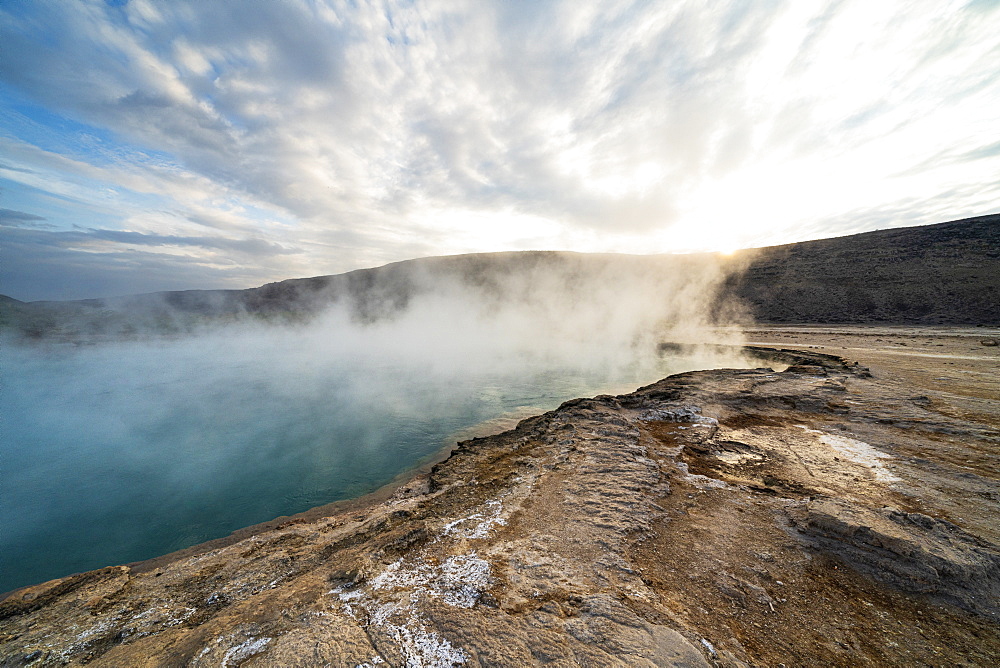 Hot water and steam spraying out of Ala Lobet (Alol Bet) geyser, Semera, Afar Region, Ethiopia, Africa