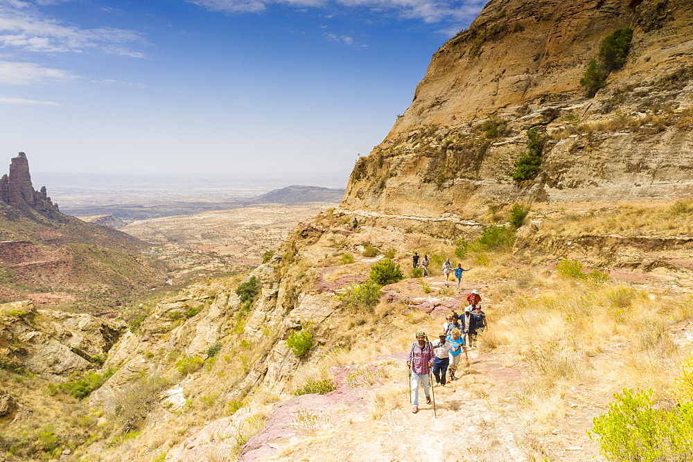 Ethiopian guides with tourists hiking to Gheralta Mountains, Tigray Region, Ethiopia, Africa