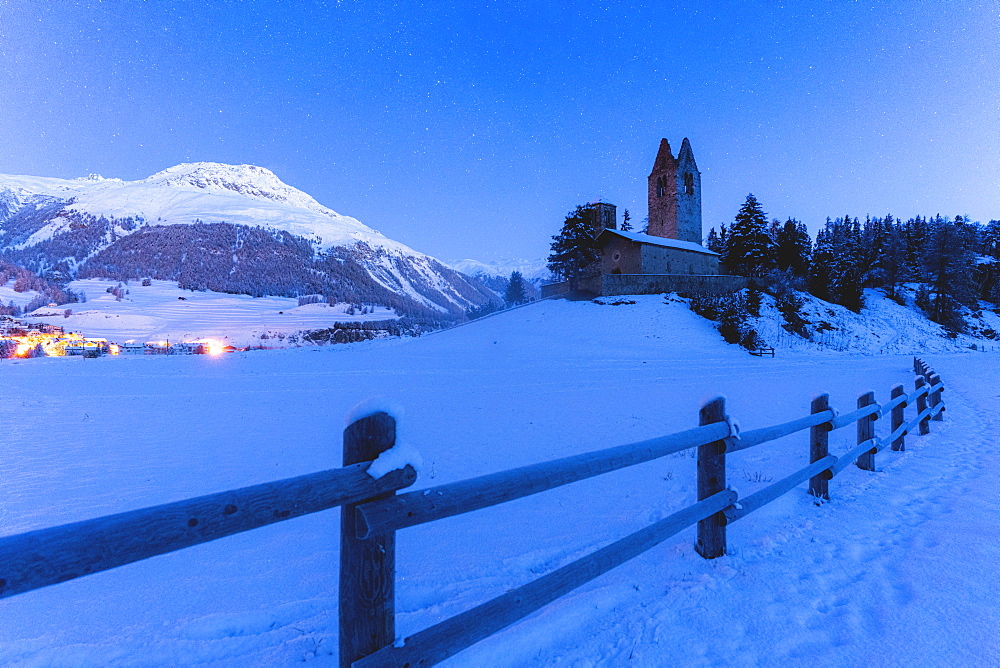 Church of San Gian with the snowy peaks in background, Celerina, St. Moritz, Engadine, canton of Graubunden, Switzerland, Europe