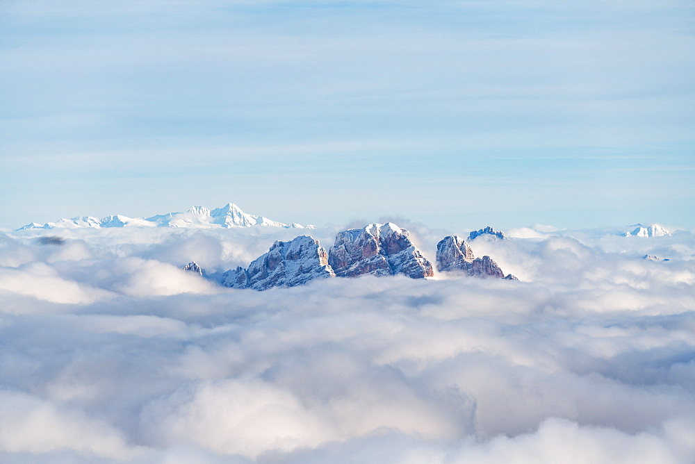 Aerial view of Monte Cristallo and Pomagagnon peaks emerging from clouds, Dolomites, Belluno province, Veneto, Italy, Europe