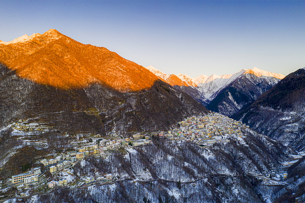 Aerial view by drone of Premana village at sunset, Valsassina, Lecco province, Lombardy, Italy, Europe