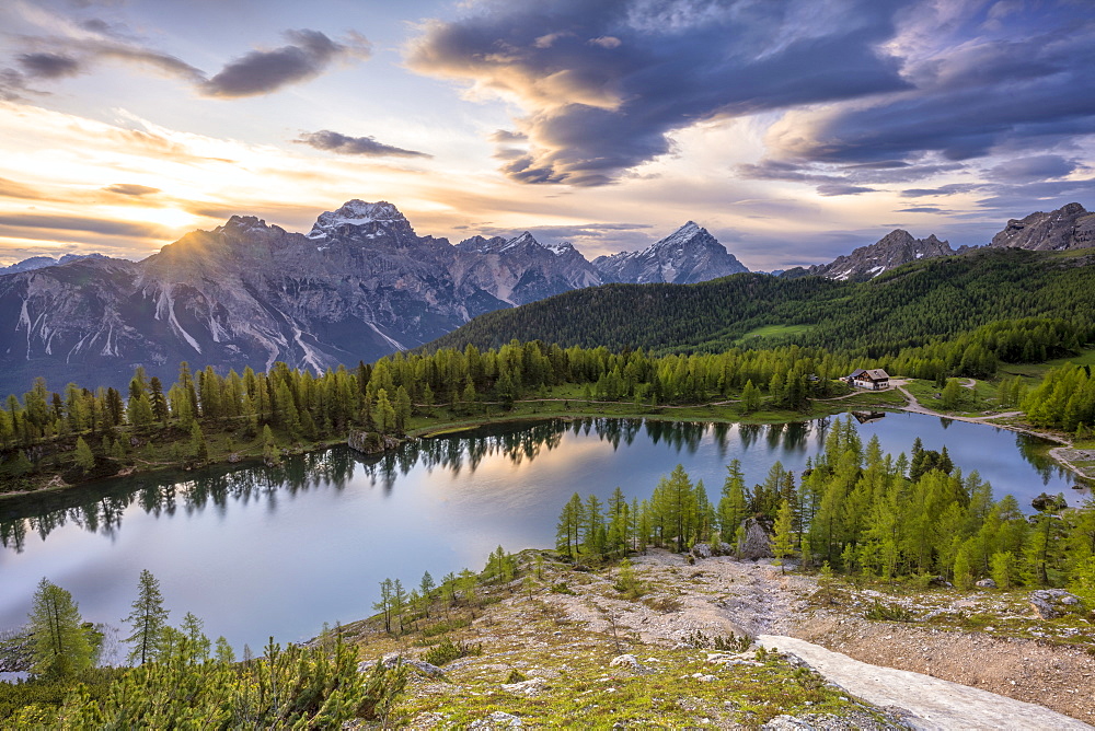 Rifugio Croda da Lago and Lake Federa at sunset with Antelao and Sorapiss in the background, Ampezzo Dolomites, Veneto, Italy, Europe