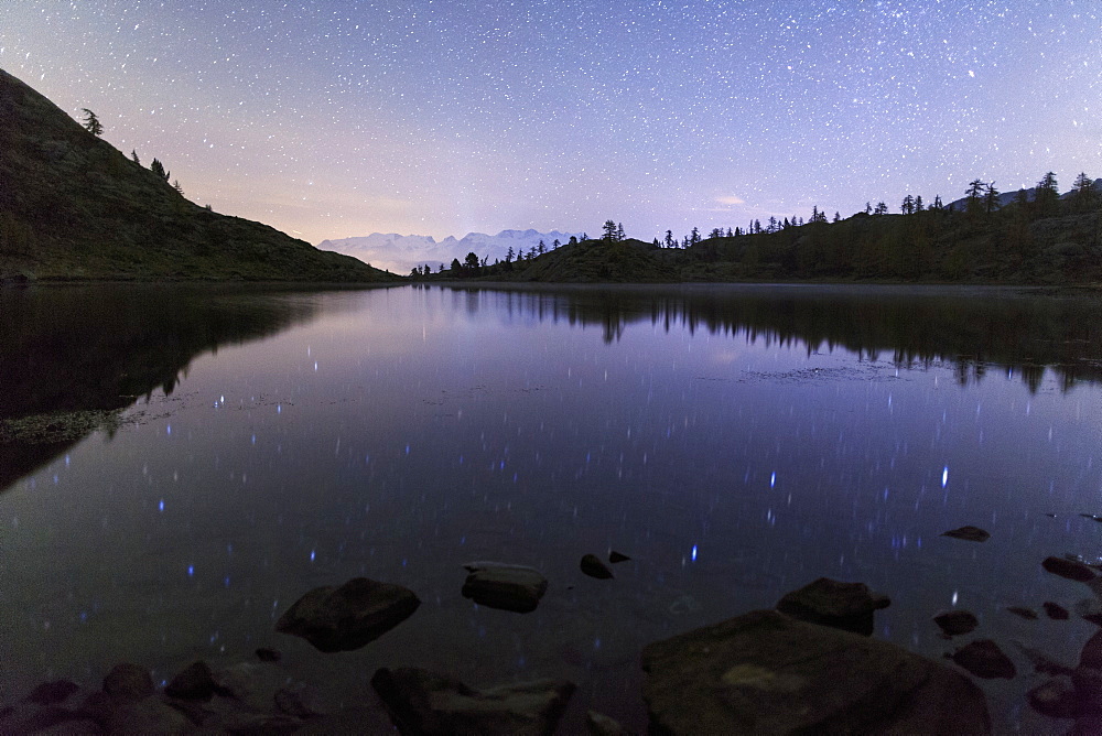 Starry night on Mount Rosa seen from Lake Vallette, Natural Park of Mont Avic, Aosta Valley, Graian Alps, Italy, Europe