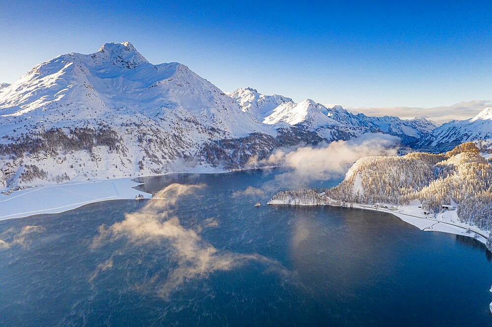 Aerial view of Lake Sils, Plaun da Lej and Isola after a snowfall, Maloja Region, Engadine, Graubunden Canton, Switzerland, Europe